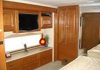 The master bedroom located in the rear of the coach The master bedroom located in the rear of the coach